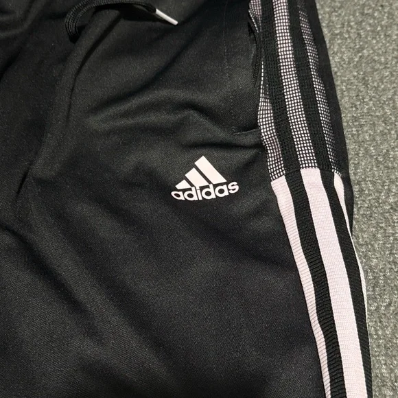 Women’s Black Adidas Tiro track pants with pink stripes. - Picture 6 of 7